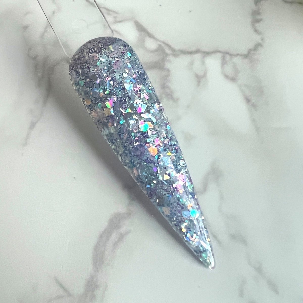 Photo shows swatch of Dipnotic Nails AC22-1 Purple Holographic Glitter Nail Dip Powder Dipnotic Nails 2022 Advent Calendar