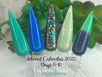 Photo shows swatch of Dipnotic Nails AC22-10 Navy, Plum, and Green Triple Thermal Dip Powder Dipnotic Nails 2022 Advent Calendar