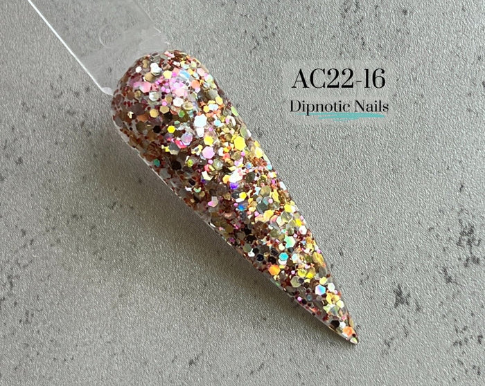 Photo shows swatch of Dipnotic Nails AC22-16 Gold and Dark Coral Nail Dip Powder Dipnotic Nails 2022 Advent Calendar