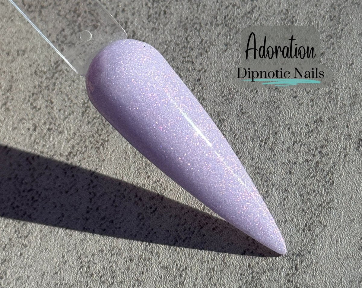 Photo shows swatch of Dipnotic Nails Adoration Purple Nail Dip Powder- The Sweetheart Collection