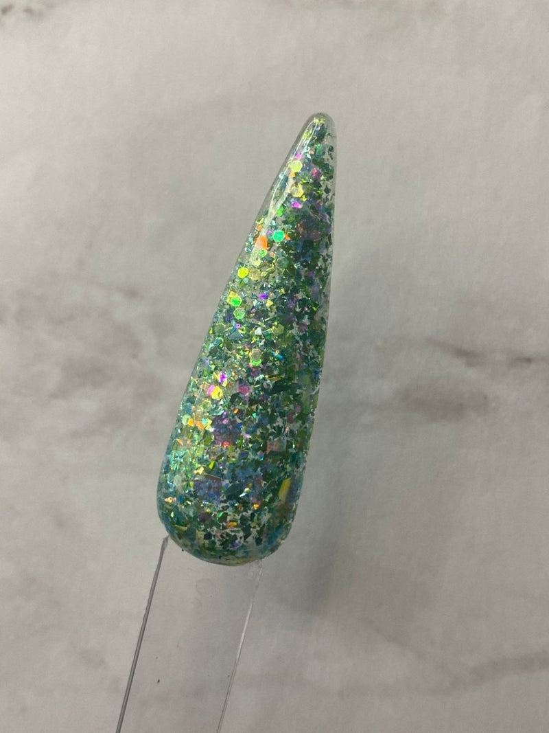 Photo shows swatch of Dipnotic Nails Agave Green Nail Dip Powder