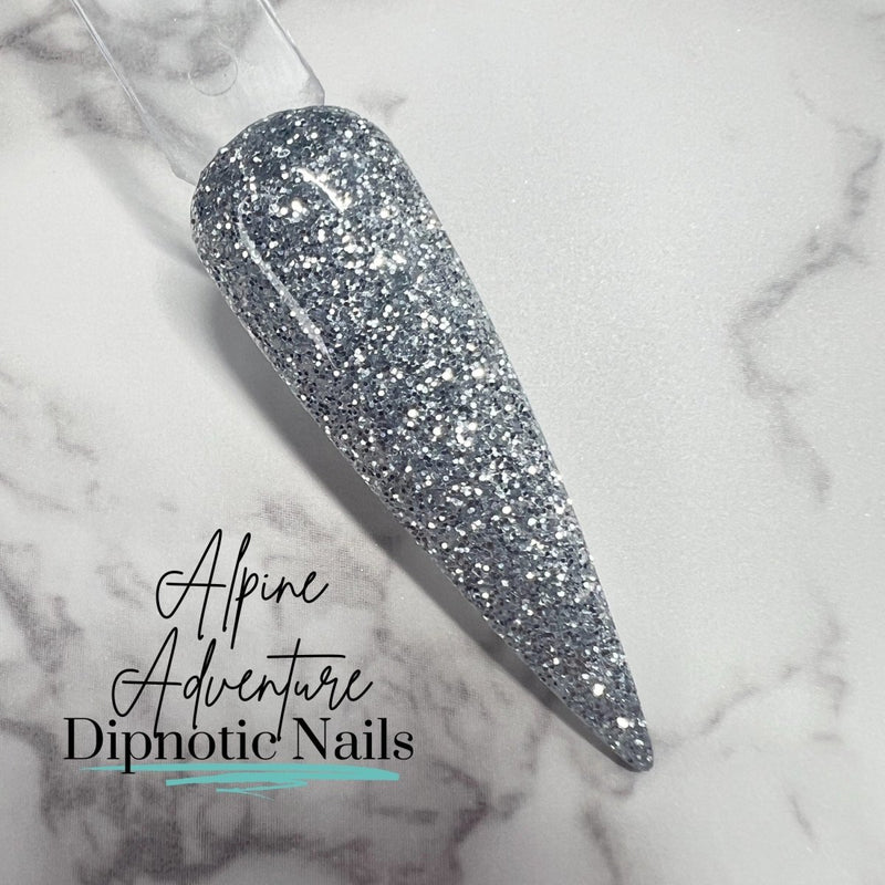 Photo shows swatch of Dipnotic Nails Alpine Adventure Satin Silver Glitter Dip Powder The Colorado Winter Collection