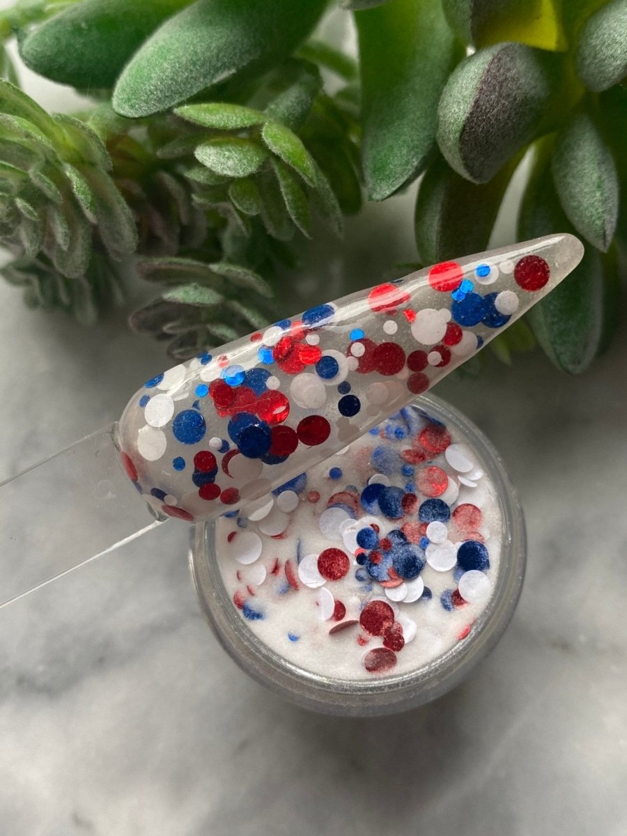 Photo shows swatch of Dipnotic Nails Americana Red White and Blue Patriotic Nail Dip Powder
