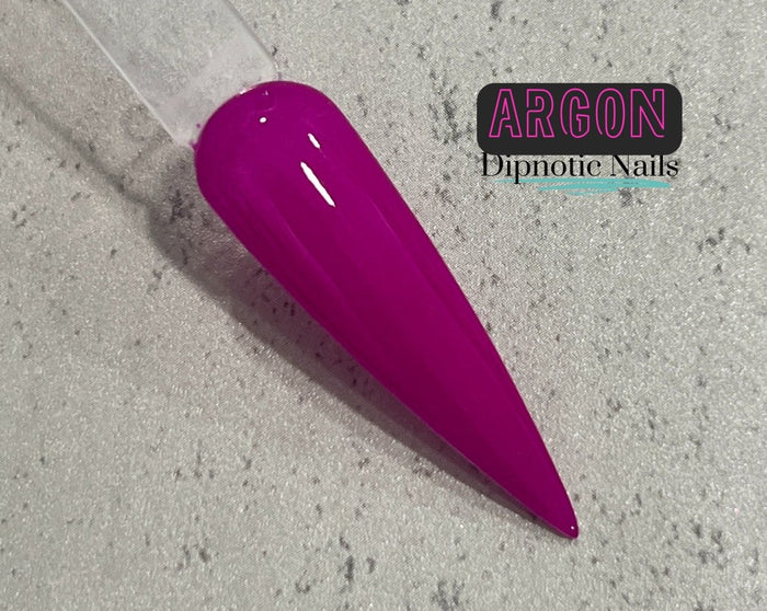 Photo shows swatch of Dipnotic Nails Argon Neon Purple Nail Dip Powder The Nineties Collection