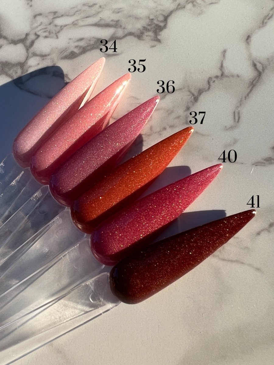 Photo shows swatch of Dipnotic Nails B-37 Red Nail Dip Powder Blush Collection