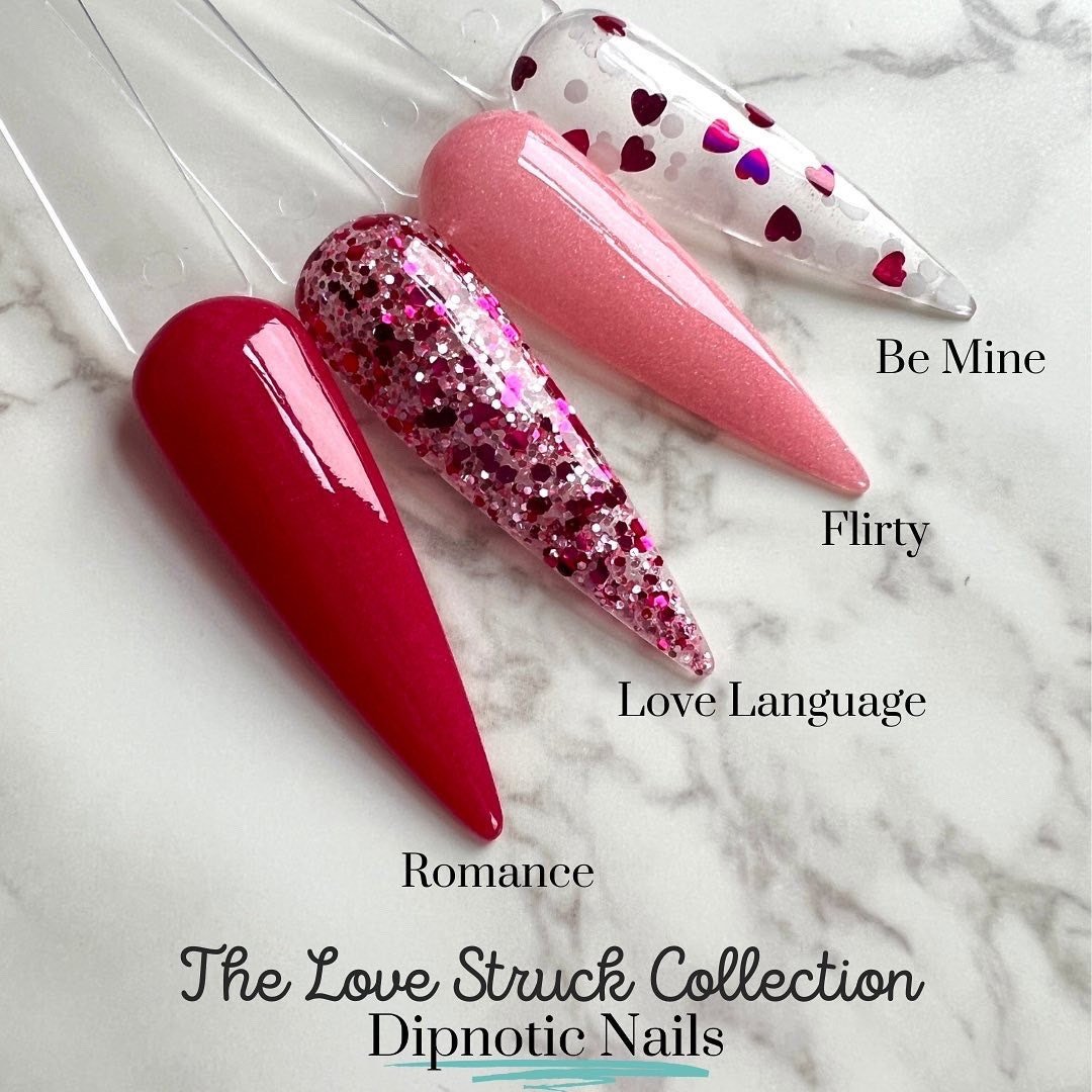 Photo shows swatch of Dipnotic Nails Be Mine Pink Heart and White Dot Glitter Dip Powder Topper The Love Struck Collection