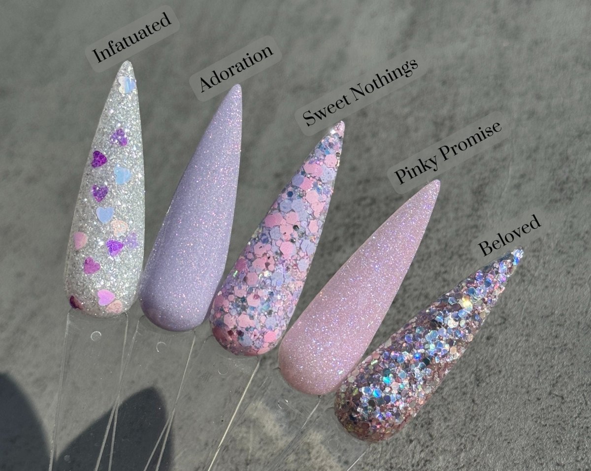 Photo shows swatch of Dipnotic Nails Beloved Pink and Purple Holographic Nail Dip Powder- The Sweetheart Collection