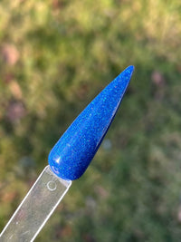 Photo shows swatch of Dipnotic Nails Boulder Navy Blue Dip Powder The Colorado Winter Collection