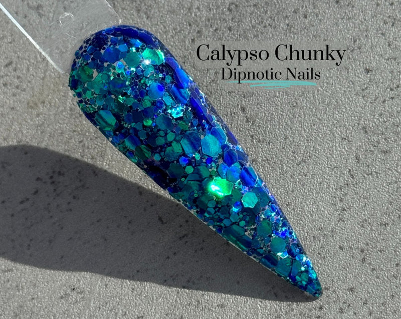 Photo shows swatch of Dipnotic Nails Calypso Chunky Blue and Teal Nail Dip Powder
