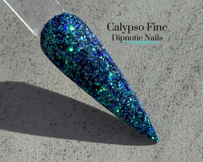 Photo shows swatch of Dipnotic Nails Calypso Fine Blue and Teal Nail Dip Powder