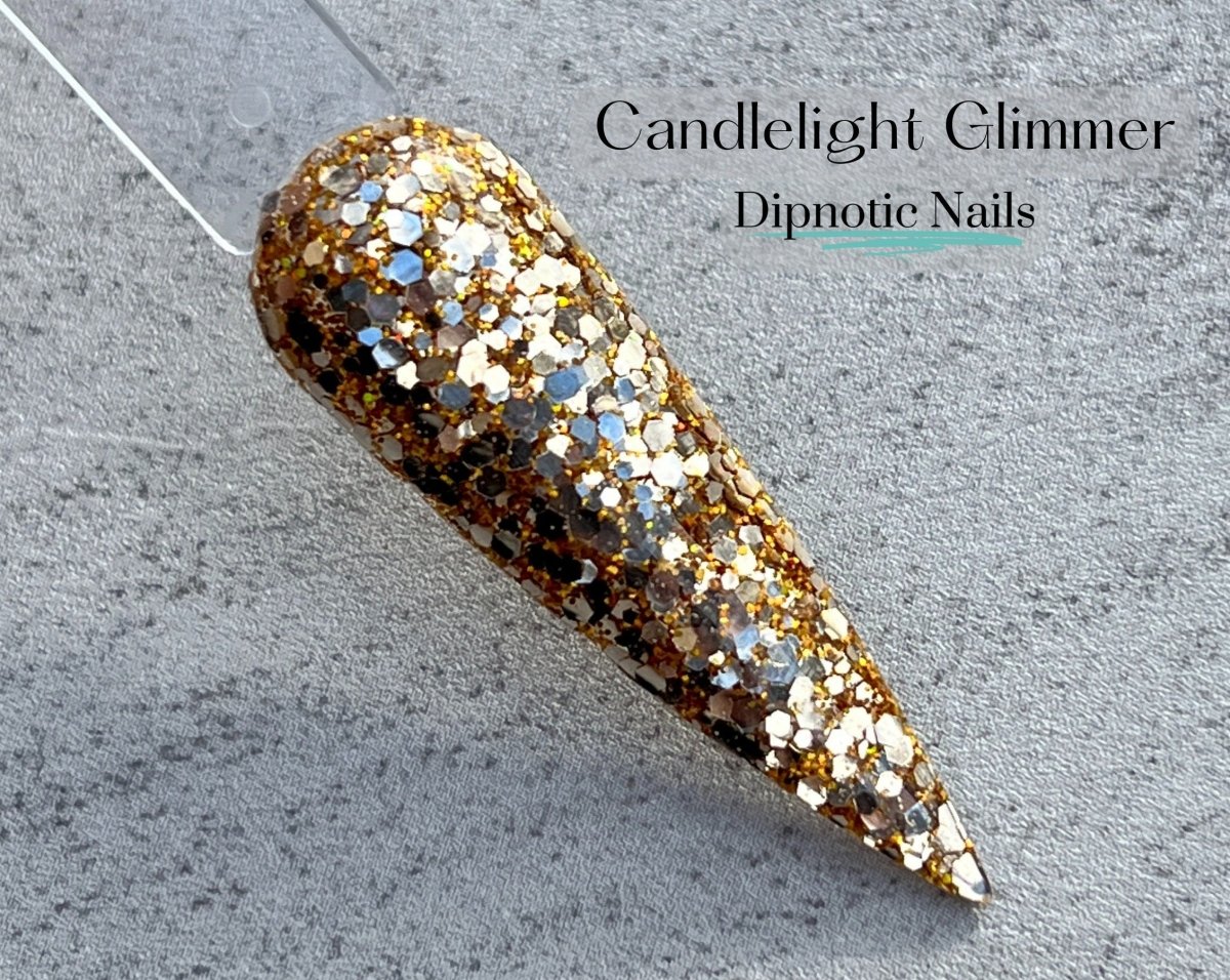 Photo shows swatch of Dipnotic Nails Candlelight Glimmer Gold Hanukkah Nail Dip Powder Latkes and Light Collection