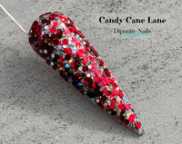 Photo shows swatch of Dipnotic Nails Candy Cane Lane Red and Silver Nail Dip Powder The Christmas Brights Collection