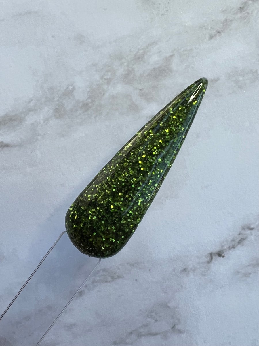 Photo shows swatch of Dipnotic Nails Canopy Green Nail Dip Powder