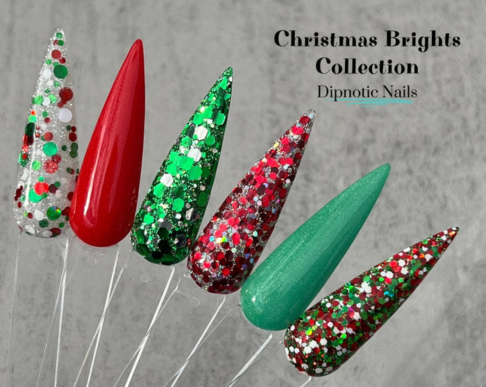 Photo shows swatch of Dipnotic Nails Christmas Brights Collection Nail Dip Powder Collection