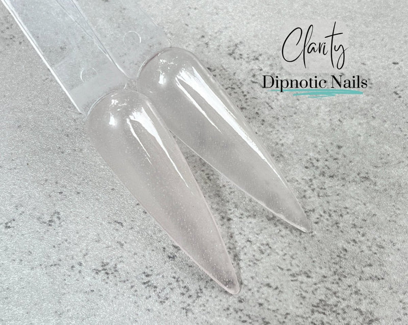 Photo shows swatch of Dipnotic Nails Clarity Sheer Nude Pink Nail Dip Powder The Sheer Nude Collection