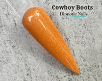 Photo shows swatch of Dipnotic Nails Cowboy Boots Warm Gold Nail Dip Powder Western Wanderlust Dip Powder Collection