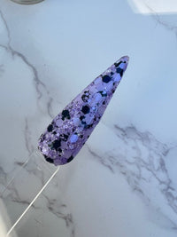 Photo shows swatch of Dipnotic Nails Creep It Real Purple and Black Glitter Nail Dip Powder Slightly Spooky Collection