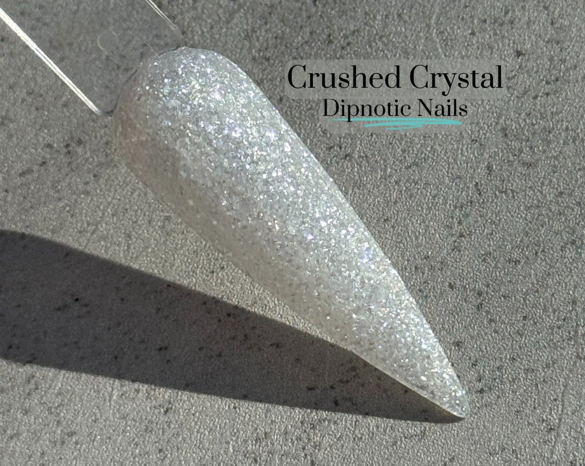 Photo shows swatch of Dipnotic Nails Crushed Crystal White Shimmer Nail Dip Powder
