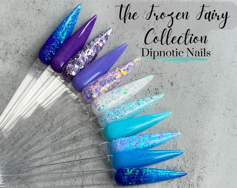 Photo shows swatch of Dipnotic Nails Crystal Wings Blue and Purple Nail Dip Powder The Frozen Fairy Collection