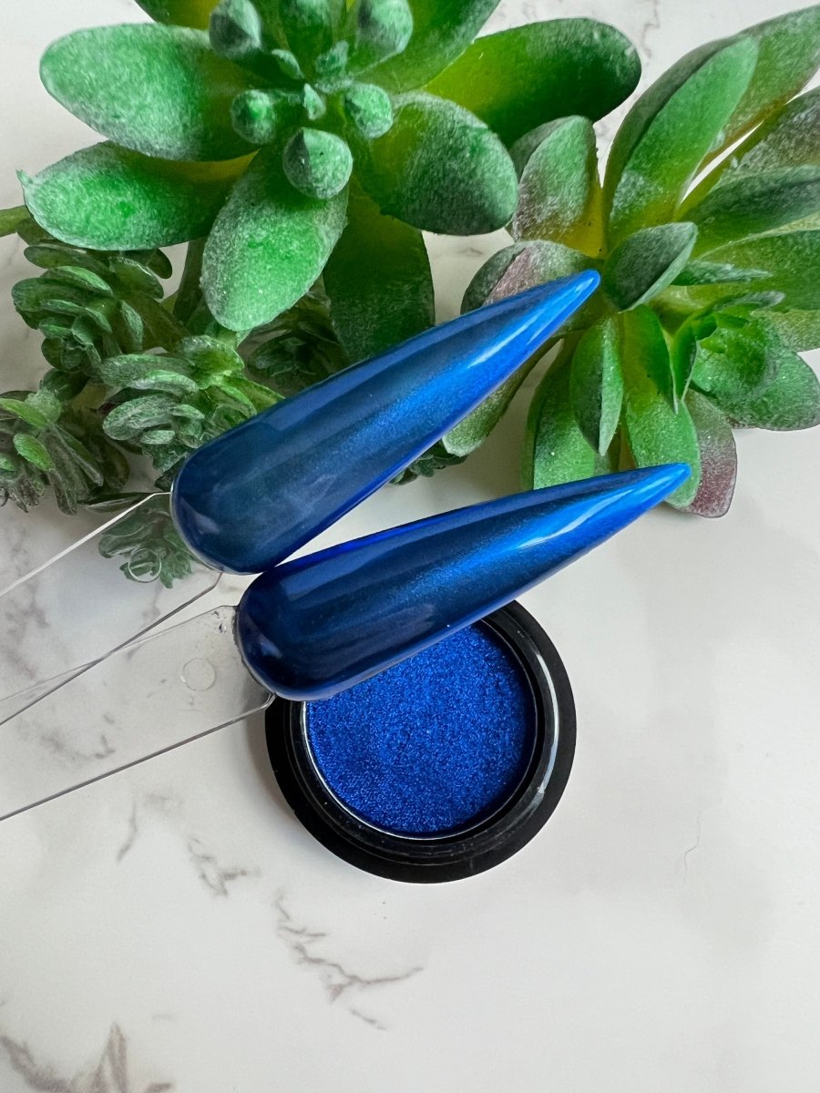 Photo shows swatch of Dipnotic Nails Dark Blue Mirror Chrome Nail Pigment Powder