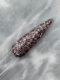 Photo shows swatch of Dipnotic Nails Desert Mosaic Pink Black and Silver Nail Dip Powder
