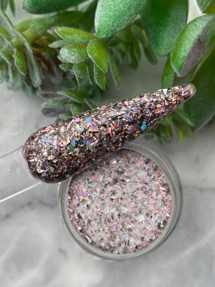 Photo shows swatch of Dipnotic Nails Desert Mosaic Pink Black and Silver Nail Dip Powder