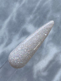 Photo shows swatch of Dipnotic Nails Diamond Dust April Birthstone White Glitter Nail Dip Powder