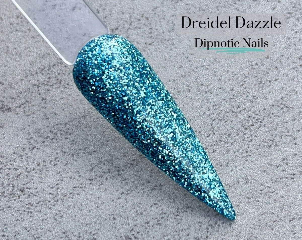 Photo shows swatch of Dipnotic Nails Dreidel Dazzle Light Blue Hanukkah Nail Dip Powder Latkes and Light Collection