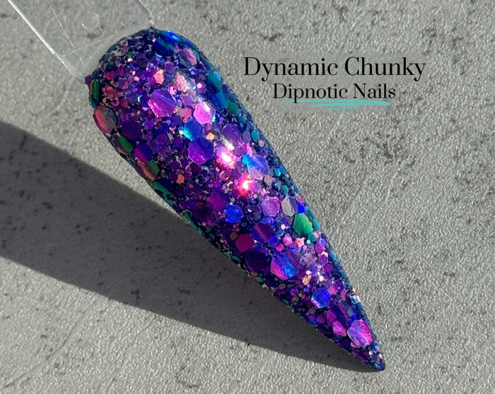 Photo shows swatch of Dipnotic Nails Dynamic Chunky Purple and Pink Nail Dip Powder
