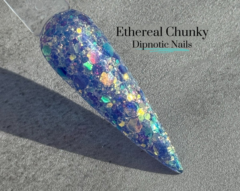 Photo shows swatch of Dipnotic Nails Ethereal Purple Chunky Glitter Nail Dip Powder