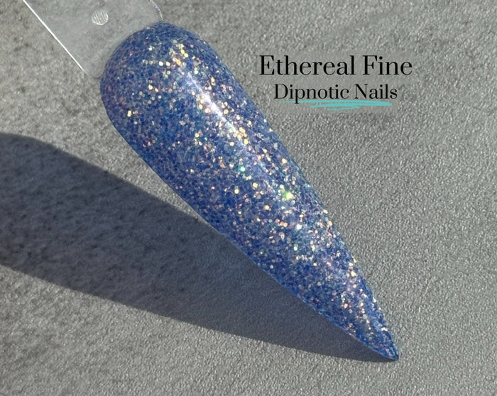 Photo shows swatch of Dipnotic Nails Ethereal Purple Fine Glitter Nail Dip Powder