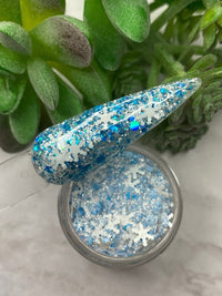 Photo shows swatch of Dipnotic Nails Flurries Blue and White Nail Dip Powder