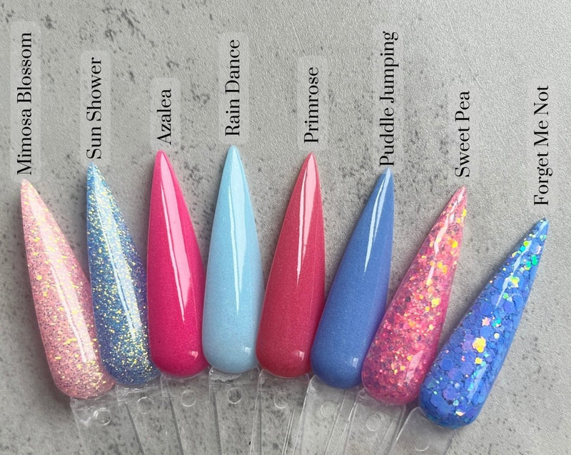 Photo shows swatch of Dipnotic Nails Forget Me Not Periwinkle Pink Gold and Teal Color Shift Nail Dip Powder The April Showers and May Flowers Collection