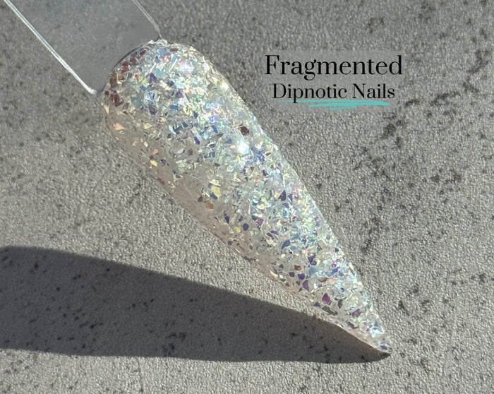 Photo shows swatch of Dipnotic Nails Fragmented White Mirror Nail Dip Powder