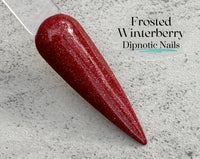 Photo shows swatch of Dipnotic Nails Frosted Winterberry Red Christmas Nail Dip Powder Christmas 2023 Collection
