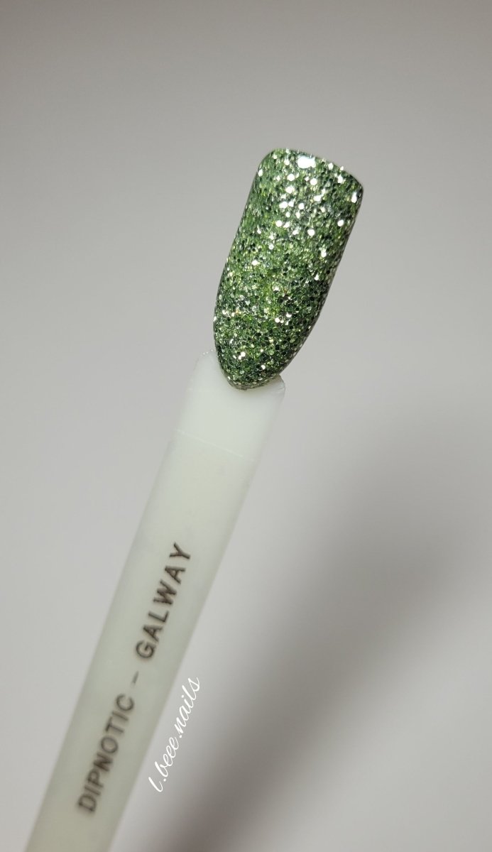Photo shows swatch of Dipnotic Nails Galway Pale Green Nail Dip Powder The Emerald Isle Collection Pt. 2