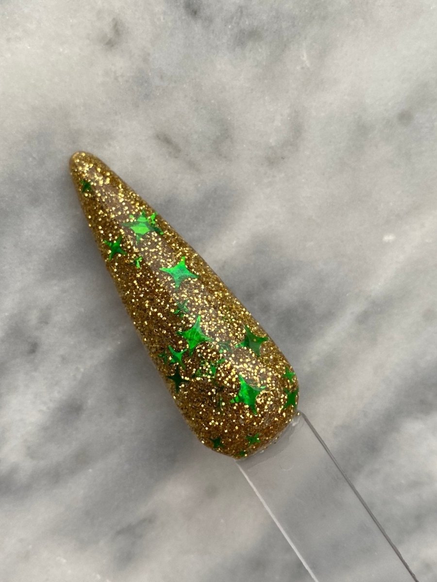Photo shows swatch of Dipnotic Nails Gifted Gold Fall Nail Dip Powder