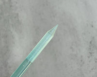 Photo shows swatch of Dipnotic Nails Glass Cuticle Pusher