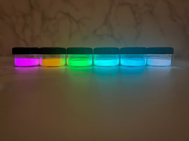 Photo shows swatch of Dipnotic Nails Glow Dip Powder Kit- Make Any Dip Powder Glow