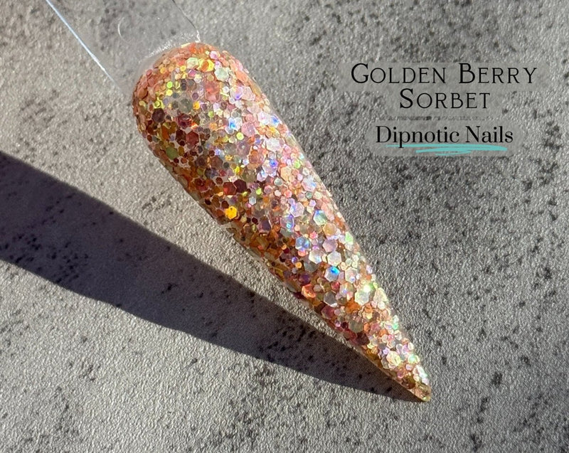 Photo shows swatch of Dipnotic Nails Golden Berry Sorbet Pink and Gold Nail Dip Powder- Raspberry Romance Collection