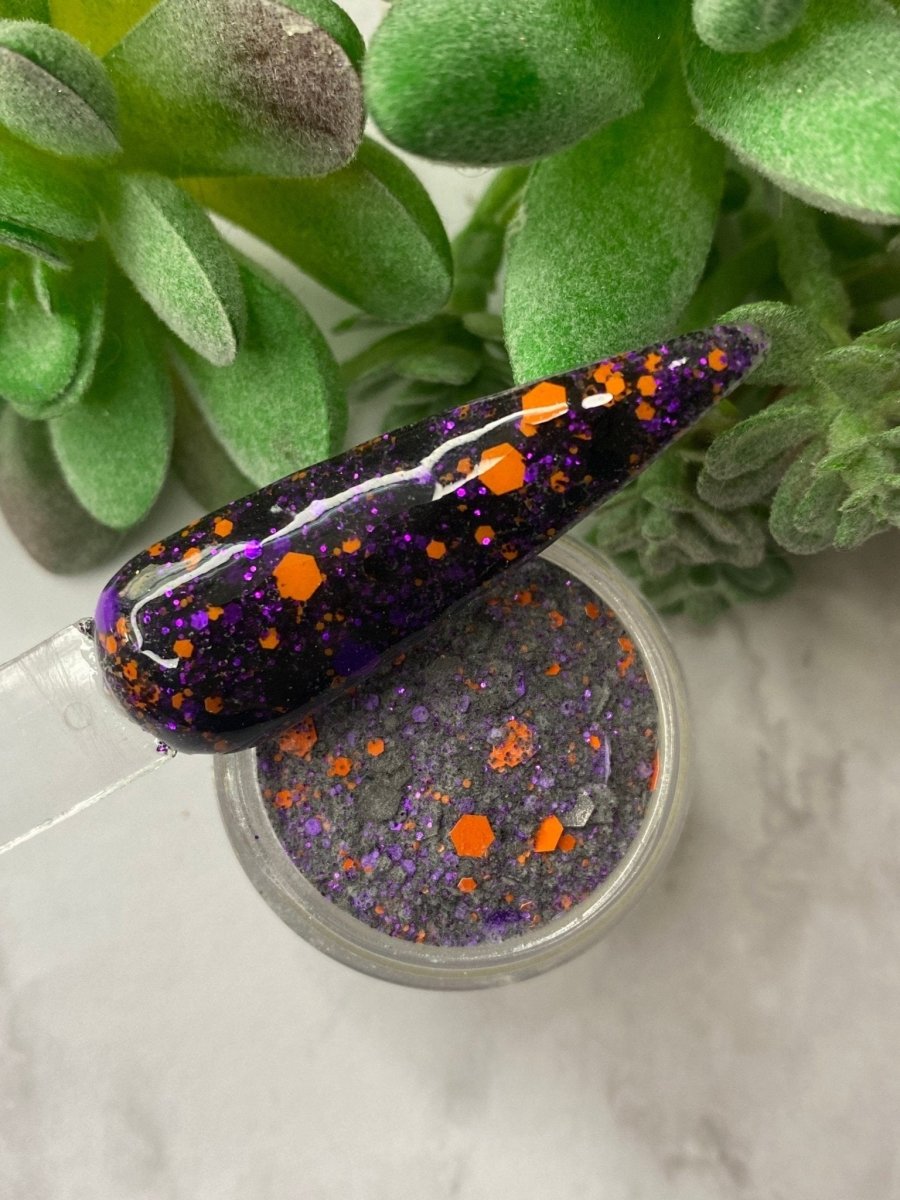 Photo shows swatch of Dipnotic Nails Halloween Glitter Collection Nail Dip Powder