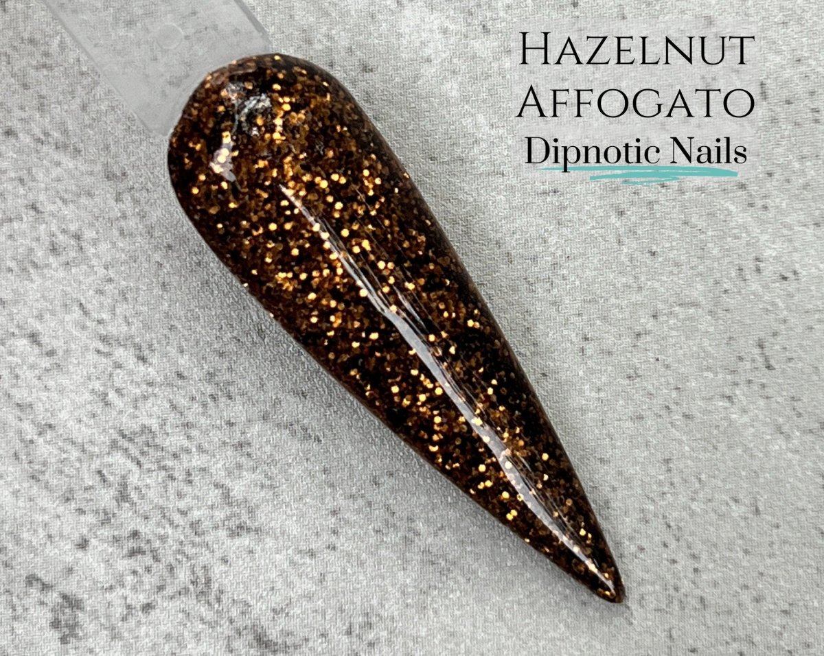 Photo shows swatch of Dipnotic Nails Hazelnut Affogato Brown Nail Dip Powder Coffee Bar Dip Powder Collection
