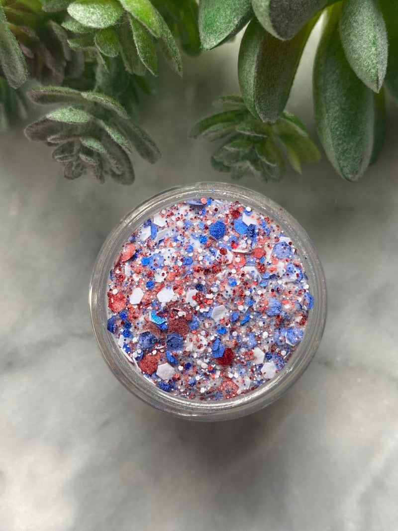 Photo shows swatch of Dipnotic Nails Independence Day Red White and Blue Patriotic Nail Dip Powder