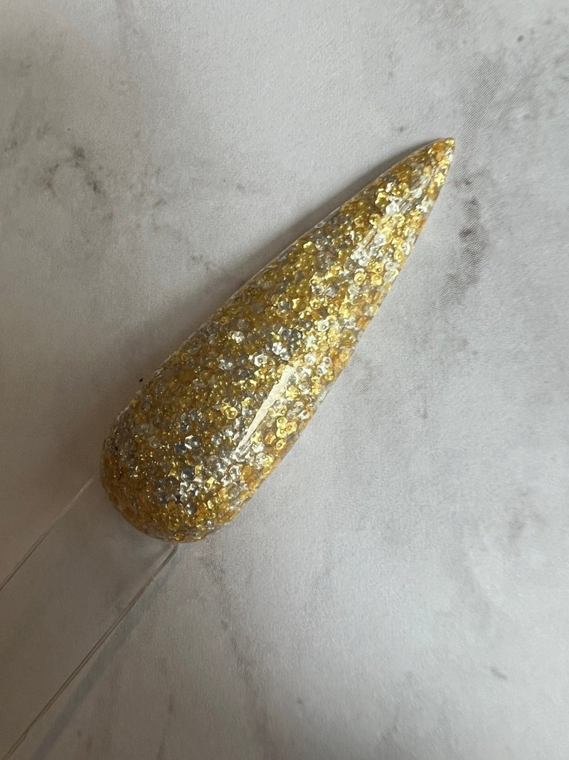 Photo shows swatch of Dipnotic Nails Jackpot Gold and Silver Glitter Nail Dip Powder The Casino Collection