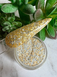 Photo shows swatch of Dipnotic Nails Jackpot Gold and Silver Glitter Nail Dip Powder The Casino Collection