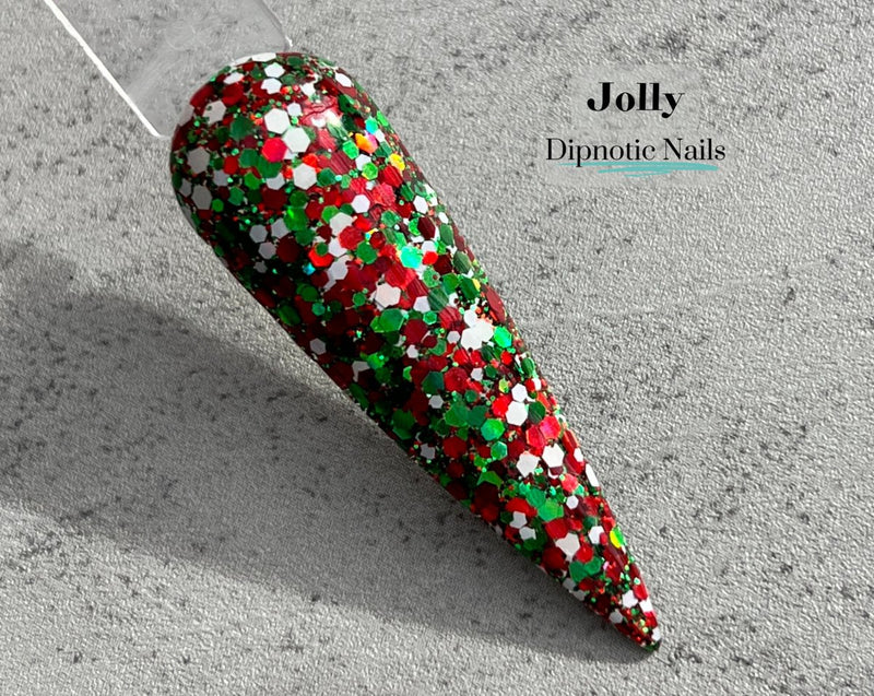 Photo shows swatch of Dipnotic Nails Jolly Red, Green, and White Nail Dip Powder The Christmas Brights Collection