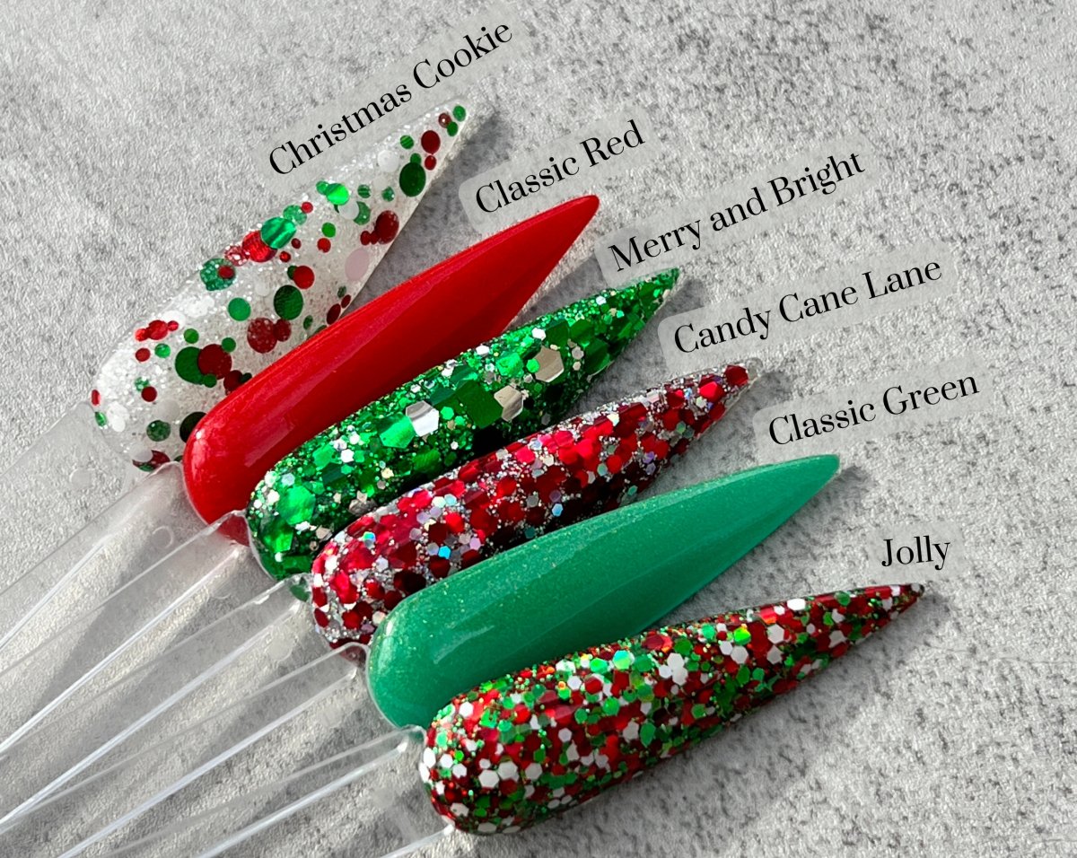 Photo shows swatch of Dipnotic Nails Jolly Red, Green, and White Nail Dip Powder The Christmas Brights Collection