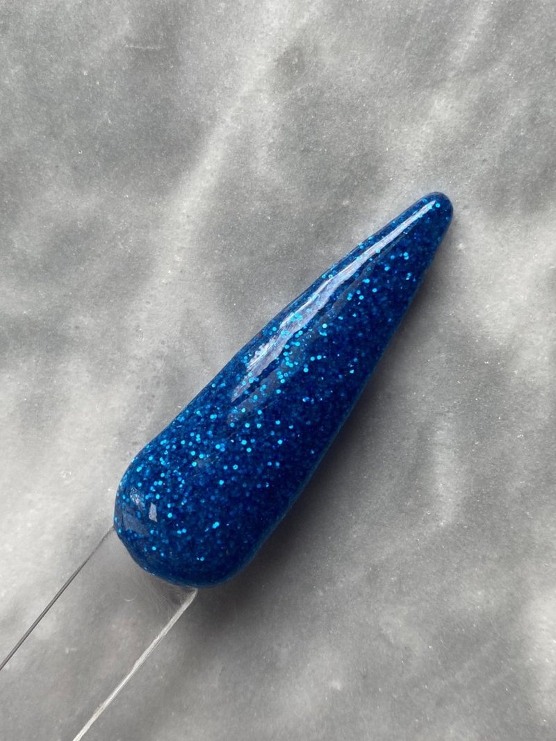 Photo shows swatch of Dipnotic Nails Justice Blue Patriotic Nail Dip Powder