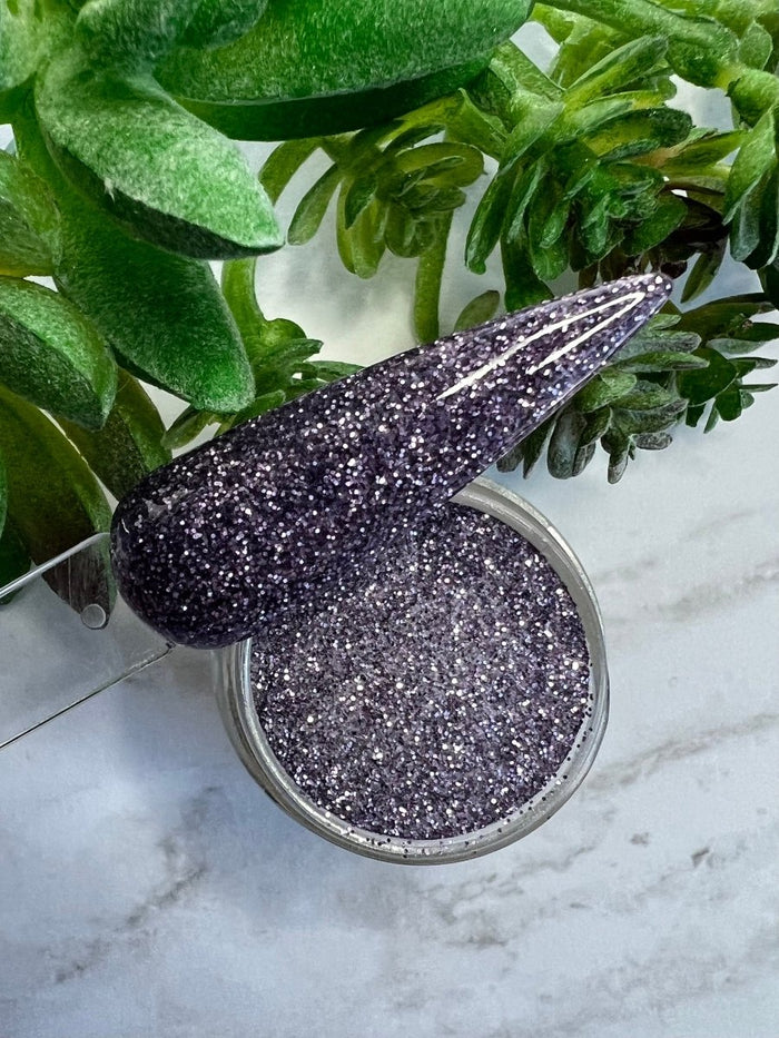 Photo shows swatch of Dipnotic Nails Lavender Purple Nail Dip Powder