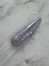 Photo shows swatch of Dipnotic Nails Lavish Purple Nail Dip Powder